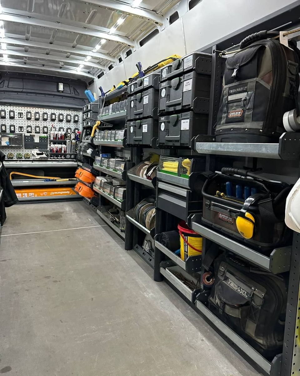 Custom van racking design - van interior with bott Smartvan van racking, shelving and van storage boxes